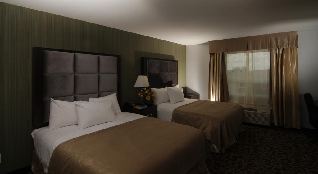 Paradise Inn And Suites Redwater Chambre photo