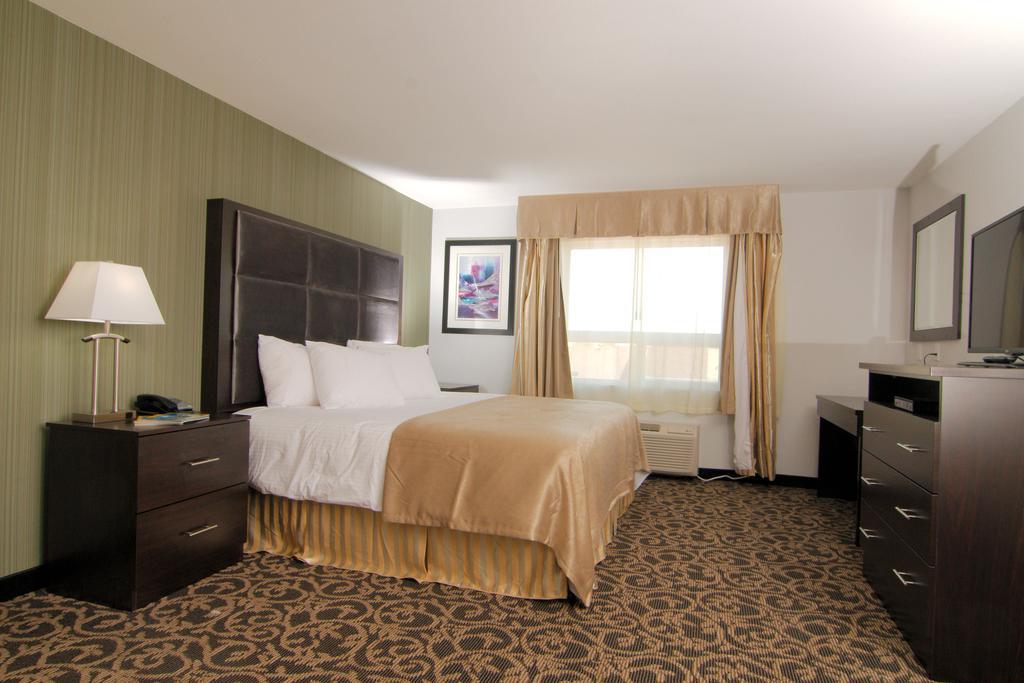 Paradise Inn And Suites Redwater Chambre photo